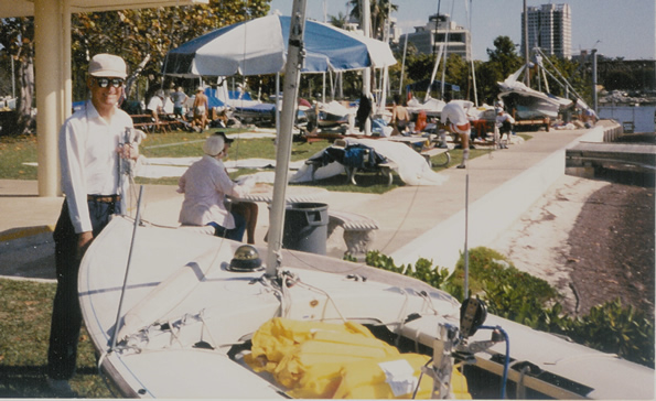 Sam at a Coconut Grove Snipe Regatta preparing for battle